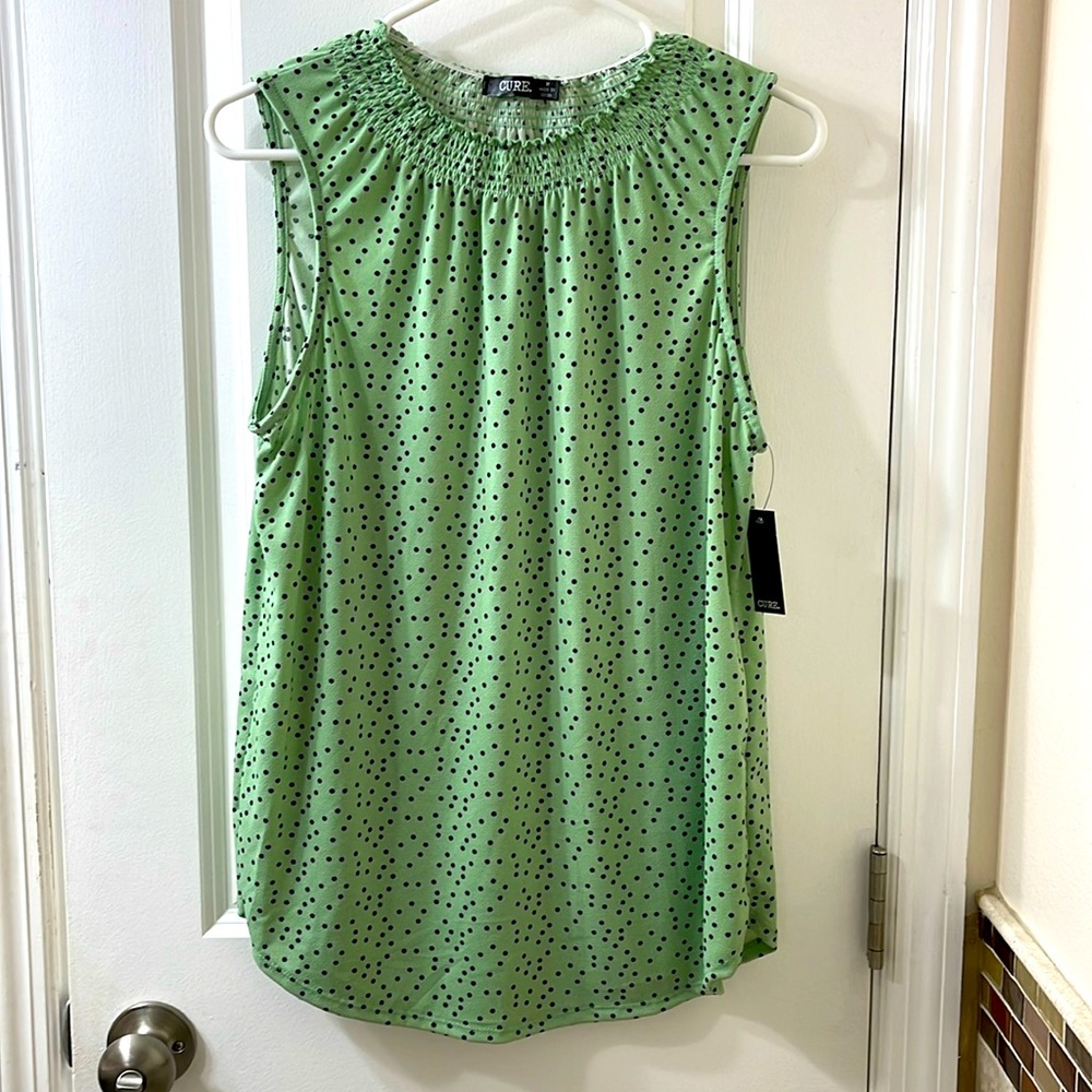 NWT sleeveless Cure blouse. Mint green with black dots. Cute! Size M